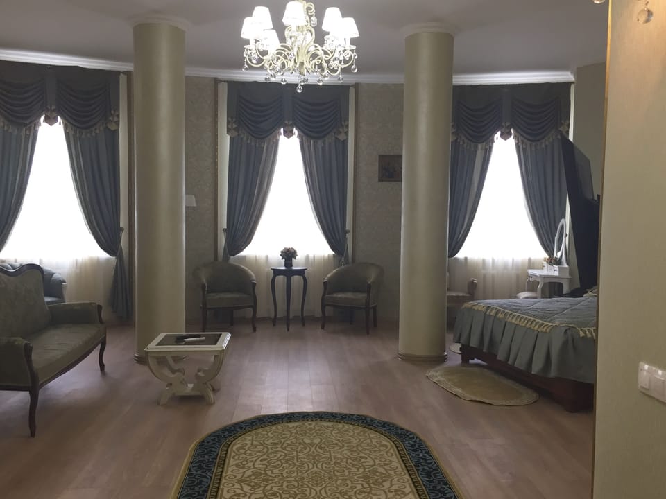 Luxury Room | Individually decorated, desk, blackout drapes, iron/ironing board