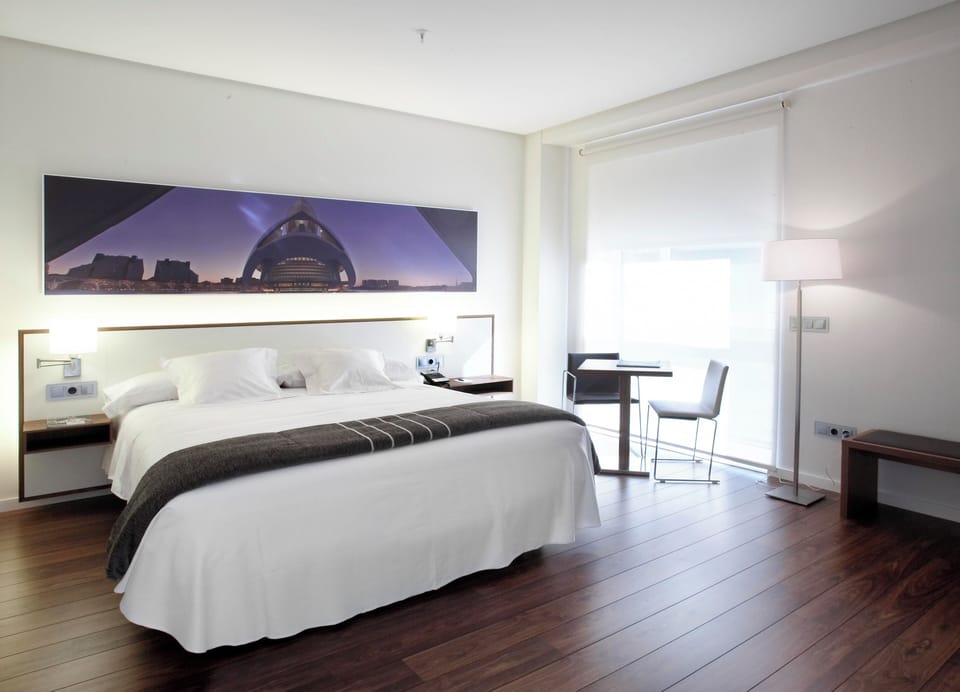 Premium bedding, down comforters, minibar, in-room safe