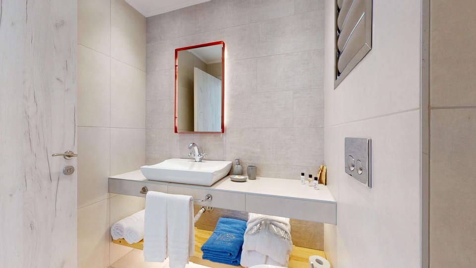 Shower, free toiletries, hair dryer, bathrobes