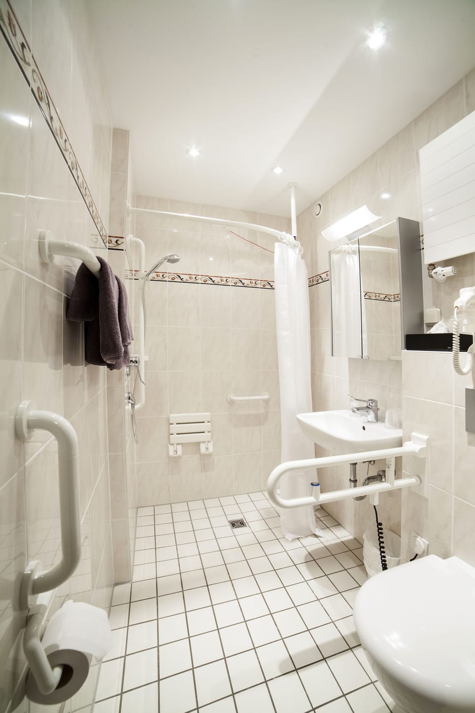Shower, free toiletries, hair dryer, towels