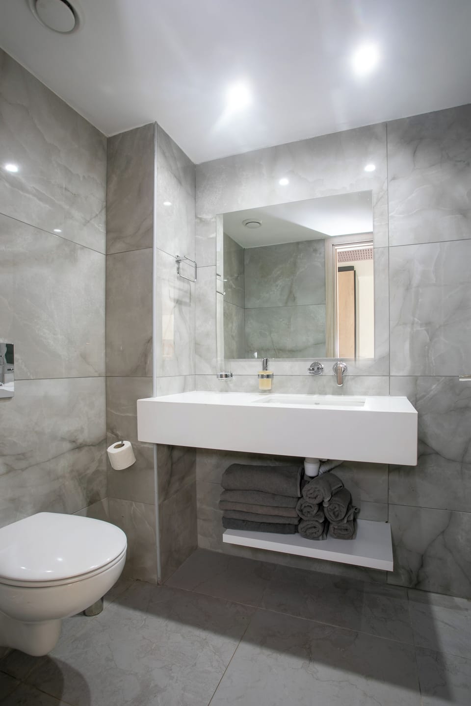 Shower, eco-friendly toiletries, hair dryer, towels