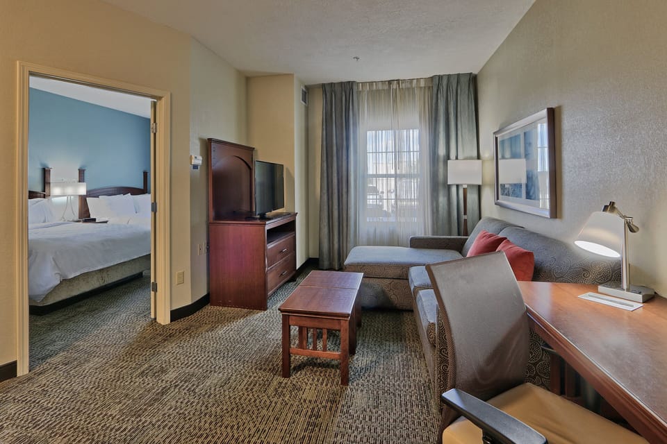 Suite, 2 Bedrooms, Kitchen | Living area | 32-inch flat-screen TV with digital channels, TV, DVD player
