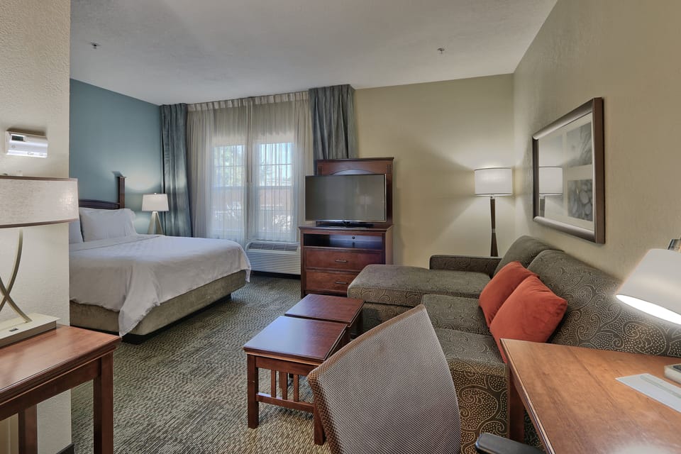 Studio Suite, 1 Queen Bed, Kitchen | Hypo-allergenic bedding, individually furnished, desk, laptop workspace