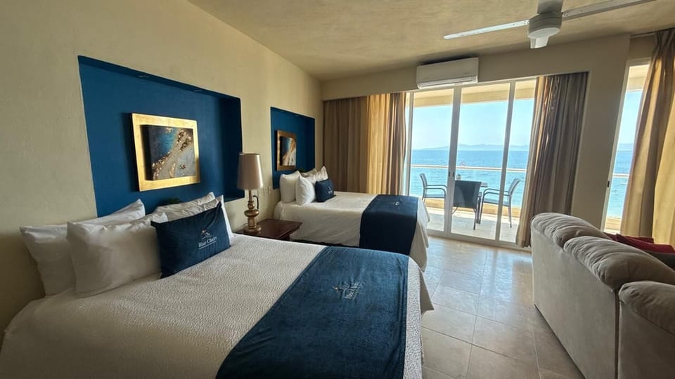 Habitación Estándar Blue Serene con 2 camas Queen | Individually decorated, individually furnished, bed sheets