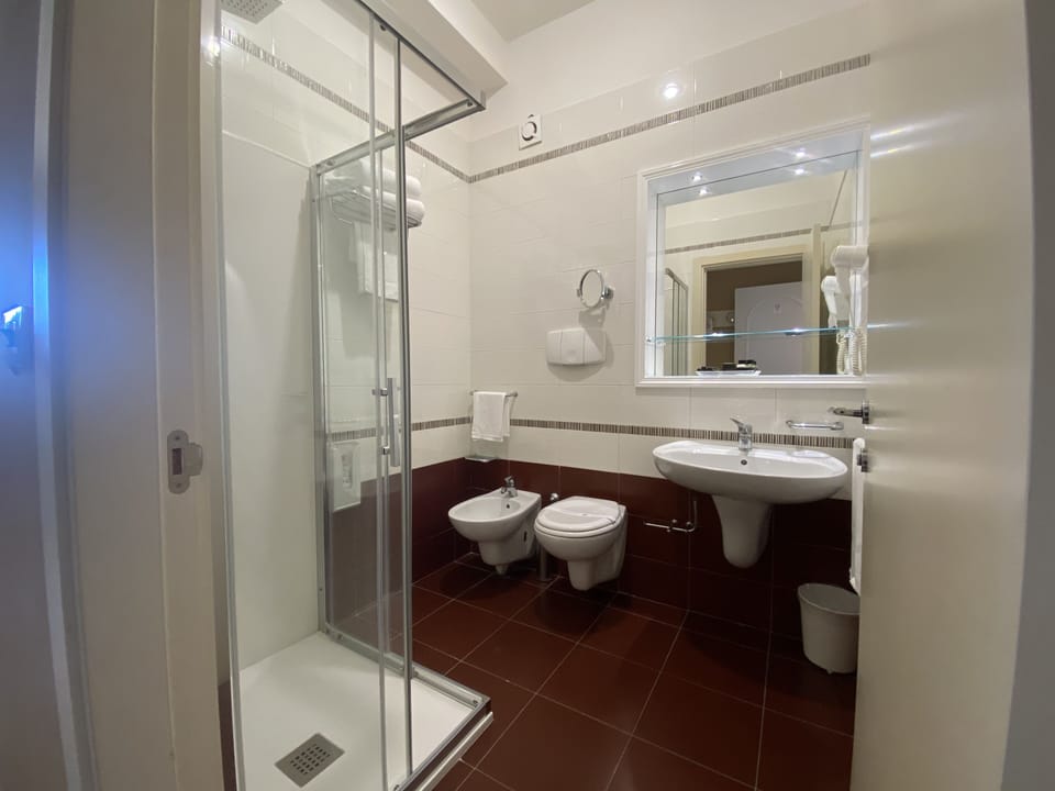 Superior Double Room, 1 Queen Bed, Sea View | Bathroom | Shower, hair dryer, towels