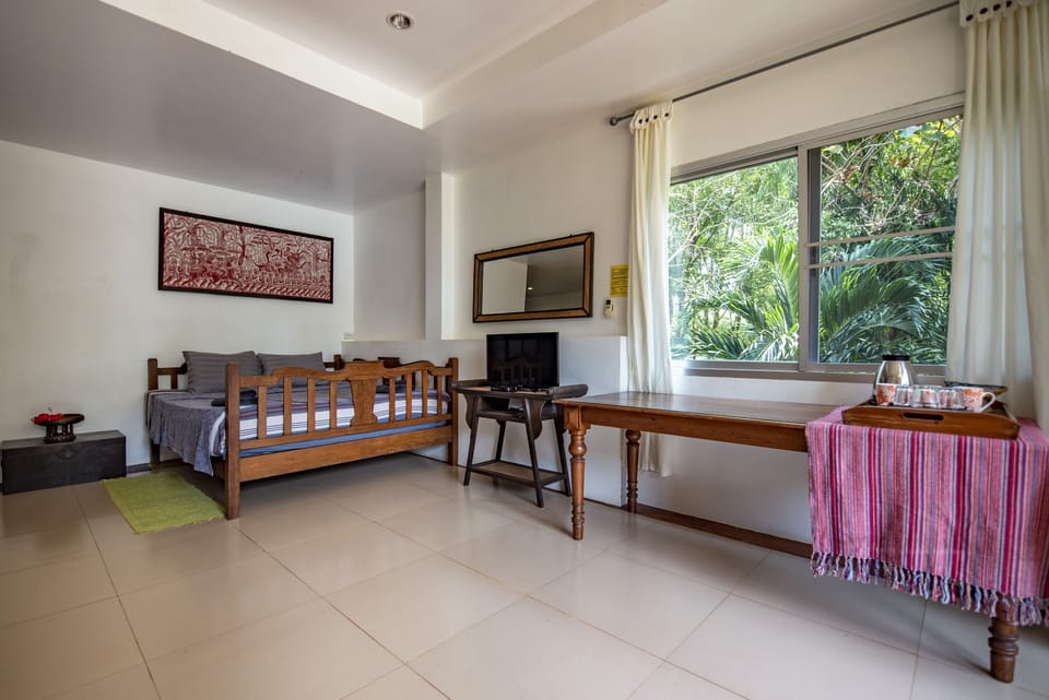 Garden View Suite | In-room safe, individually decorated, individually furnished, desk