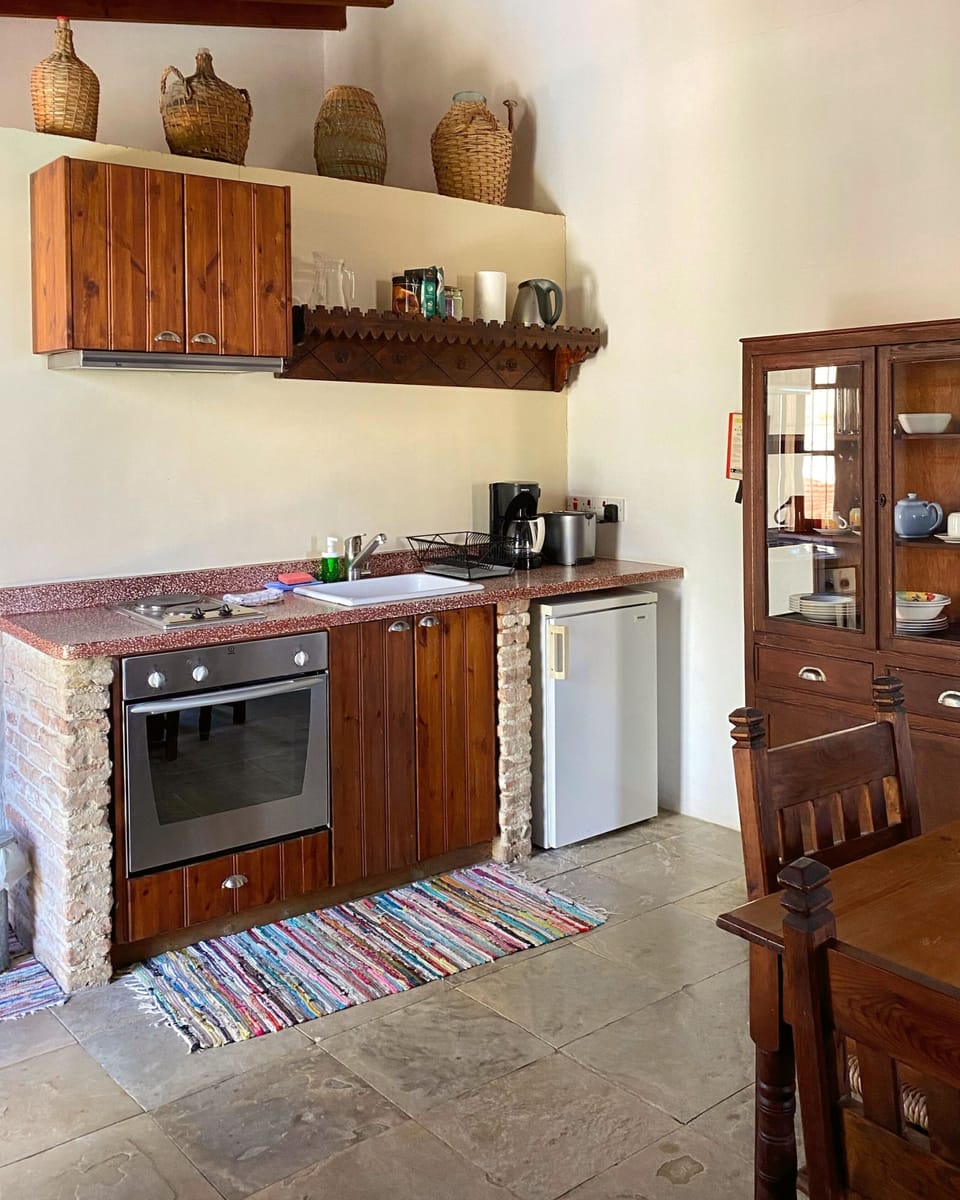 Apartment, 1 Bedroom | Private kitchen | Coffee/tea maker, fridge, oven, stovetop
