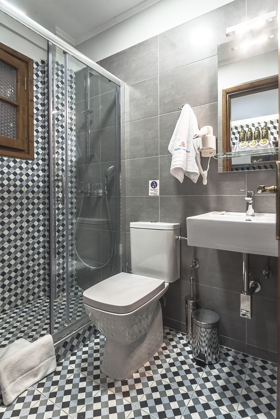 Shower, free toiletries, hair dryer, slippers