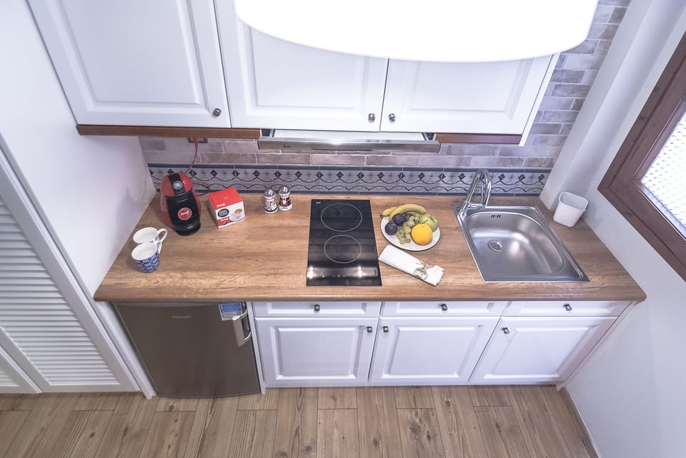 Fridge, stovetop, espresso maker, electric kettle