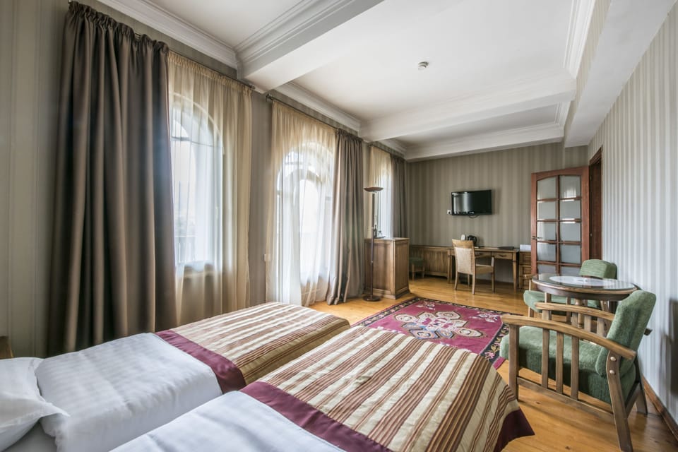 Deluxe Twin Room, City View | In-room safe, desk, soundproofing, free WiFi