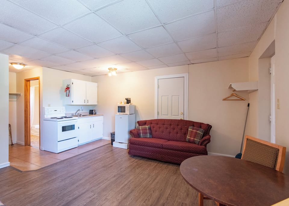 Suite, 2 Queen Beds, Non Smoking, Kitchenette (Main Floor) | Private kitchen | Fridge, microwave, coffee/tea maker