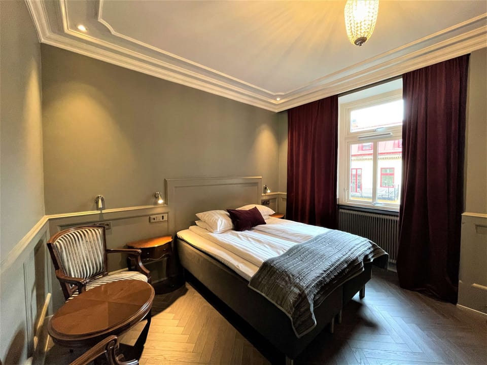 Desk, laptop workspace, iron/ironing board (on request), cribs (free)