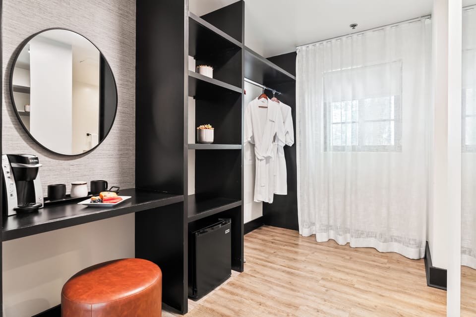 Courtyard King + Twin | Premium bedding, desk, blackout drapes, iron/ironing board