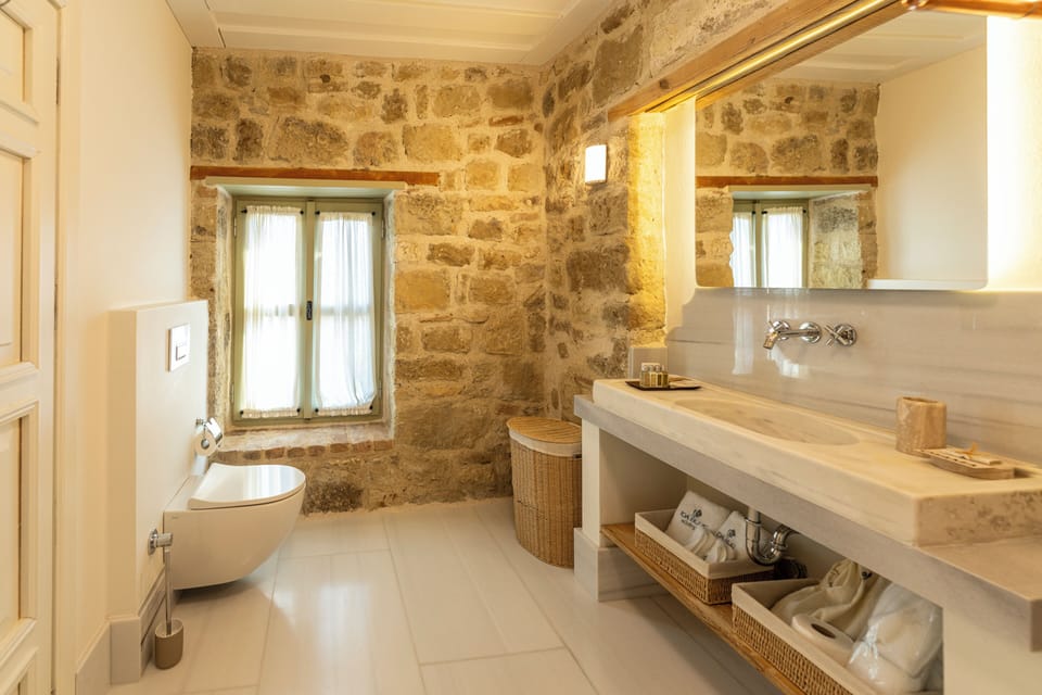 Deluxe Double Room, Garden View | Bathroom | Shower, rainfall showerhead, designer toiletries, hair dryer