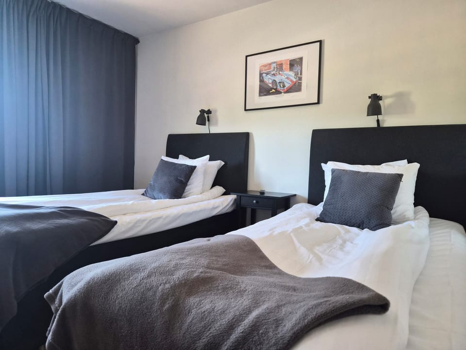 Standard Double Room | Desk, blackout drapes, iron/ironing board (on request), WiFi (free)