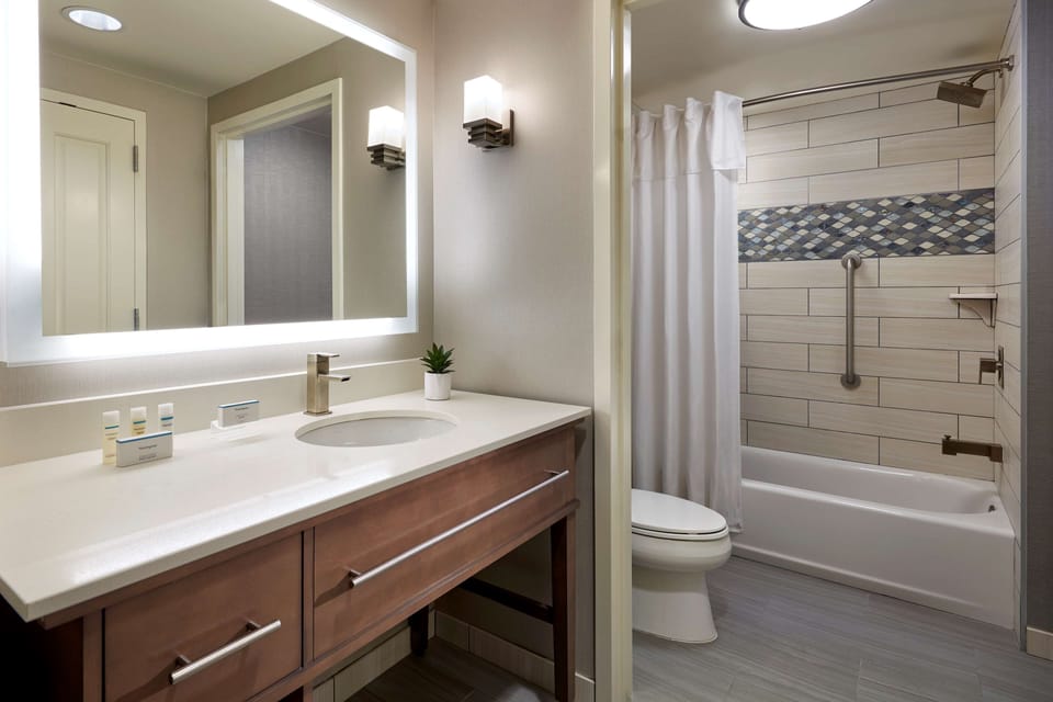 Hair dryer, towels, soap, shampoo