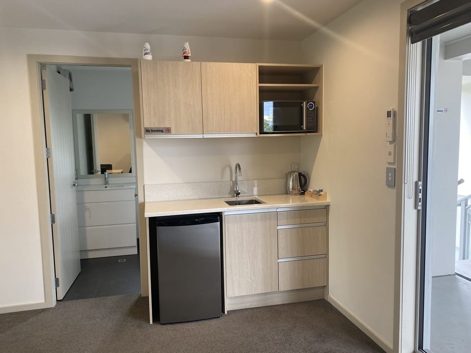 Executive Room, 2 Bedrooms, Refrigerator & Microwave (First Floor) | Private kitchen | Coffee/tea maker, fridge, microwave, electric kettle