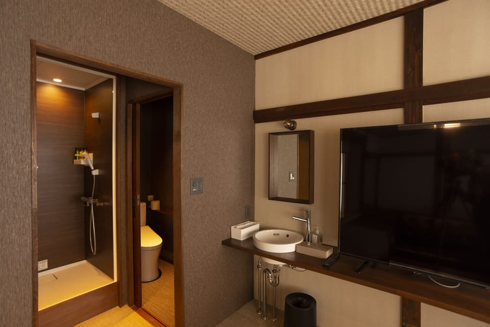 Design Triple Room, Non Smoking | Bathroom | Separate tub and shower, spring water tub, free toiletries, hair dryer