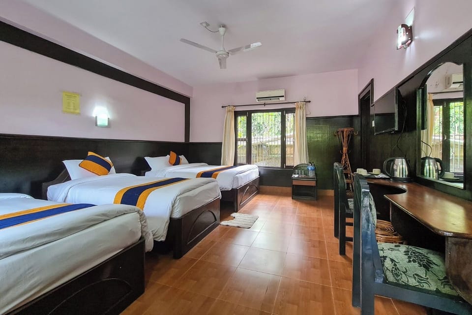 Family Room, Garden View | Desk, laptop workspace, iron/ironing board, free WiFi