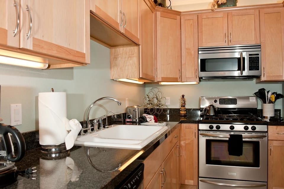 Condo, 2 Bedrooms, Ocean View, Beachfront | Private kitchen | Fridge, microwave, oven, stovetop