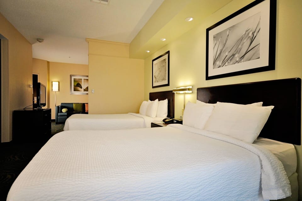 In-room safe, desk, iron/ironing board, cribs (free)