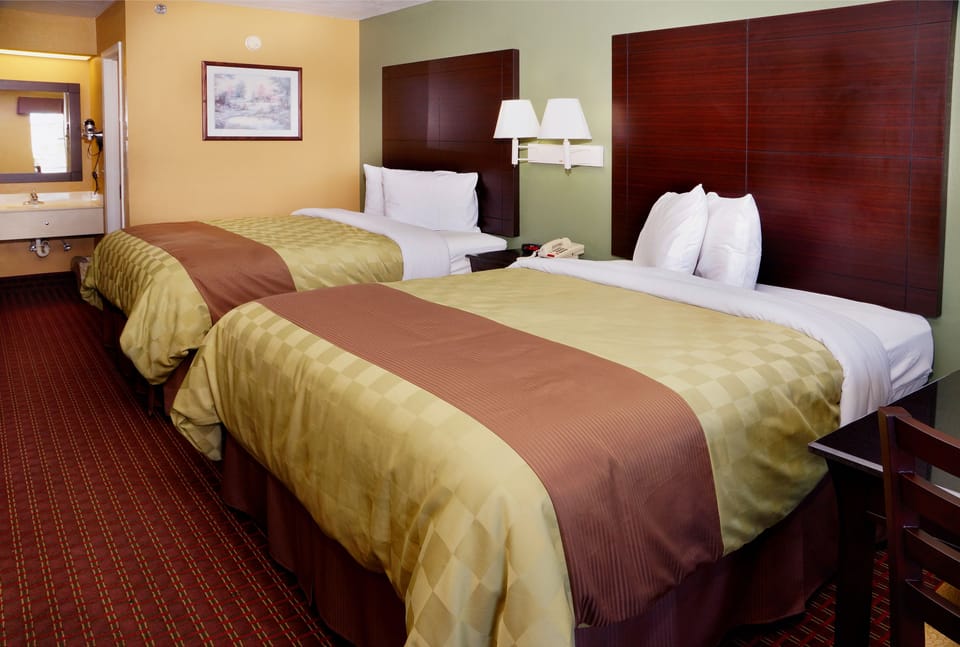 Room, 2 Queen Beds | Bathroom | Shower, rainfall showerhead, hair dryer