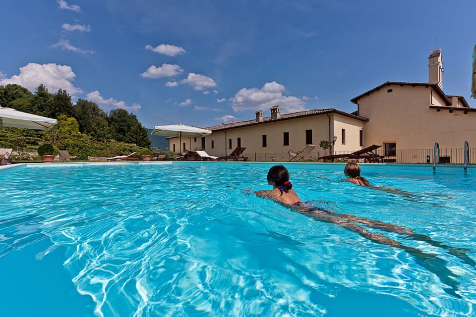 Indoor pool, seasonal outdoor pool, pool umbrellas, sun loungers
