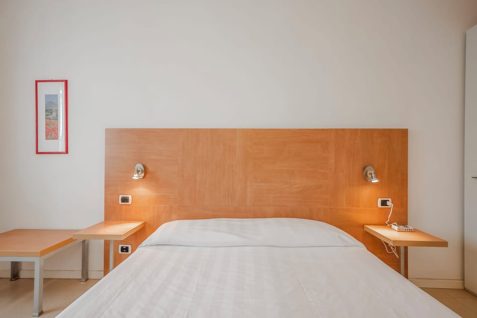Down comforters, pillowtop beds, blackout drapes, free WiFi