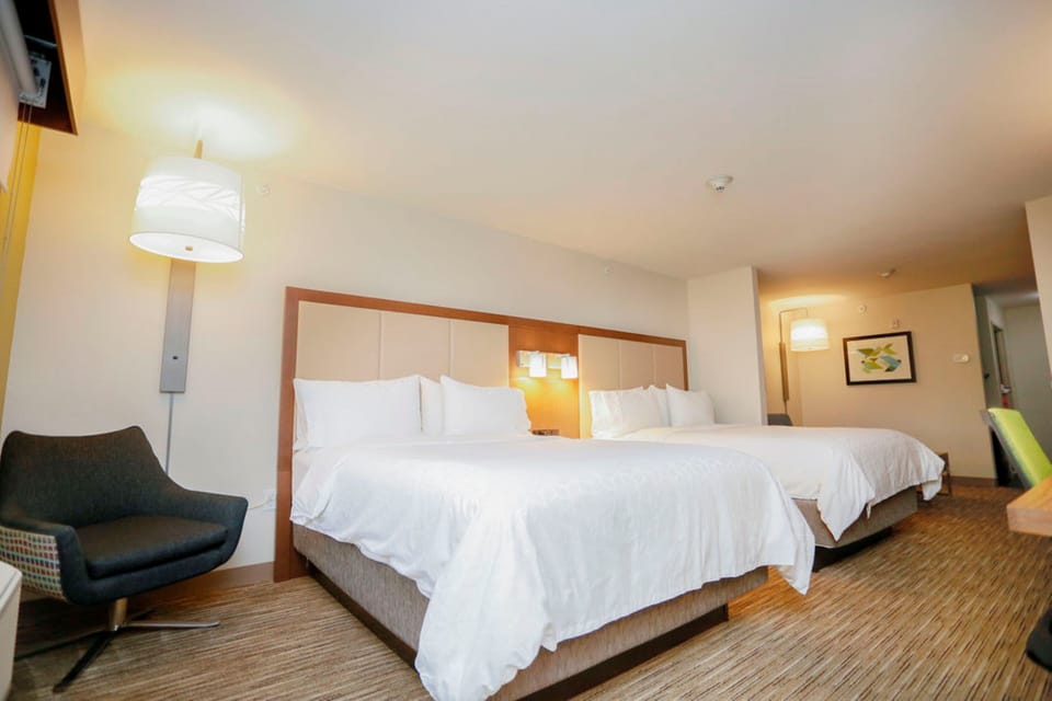 In-room safe, desk, iron/ironing board, cribs (free)