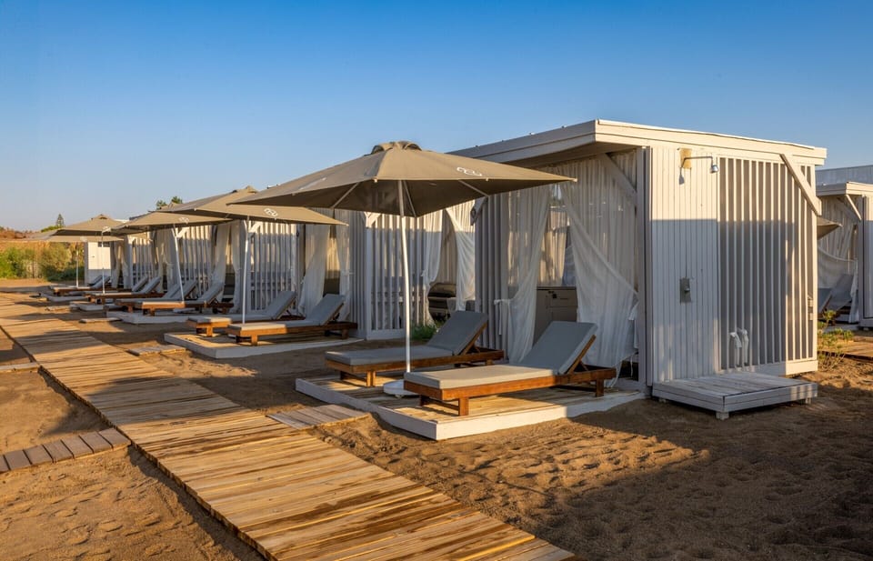 Private beach, sun loungers, beach umbrellas, beach volleyball