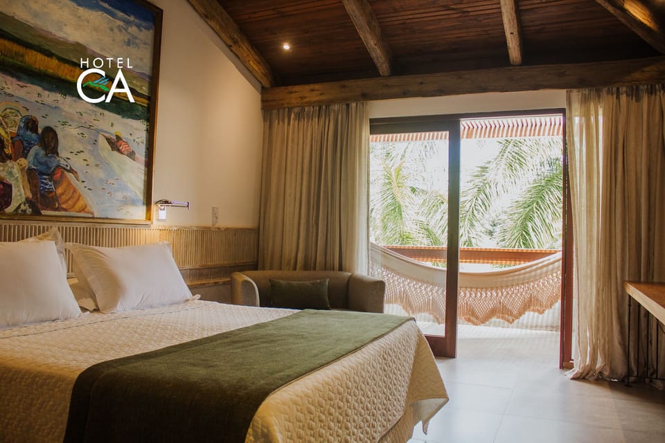 Junior Suite, Lanai, River View (Suite das Aguas) | Minibar, in-room safe, blackout drapes, bed sheets