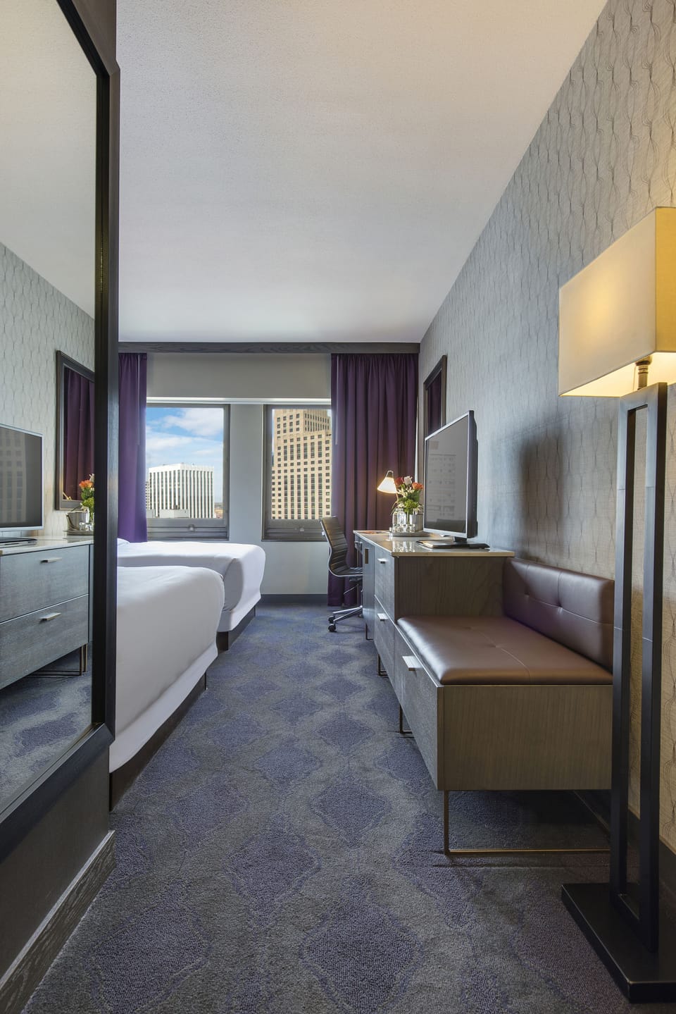 Premium bedding, down comforters, in-room safe, desk