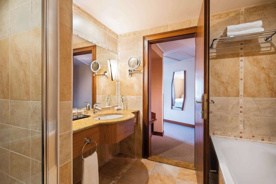 Eco-friendly toiletries, hair dryer, slippers, heated floors