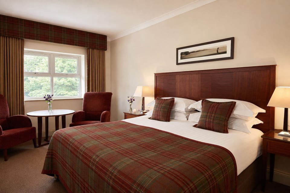Hypo-allergenic bedding available, in-room safe, desk