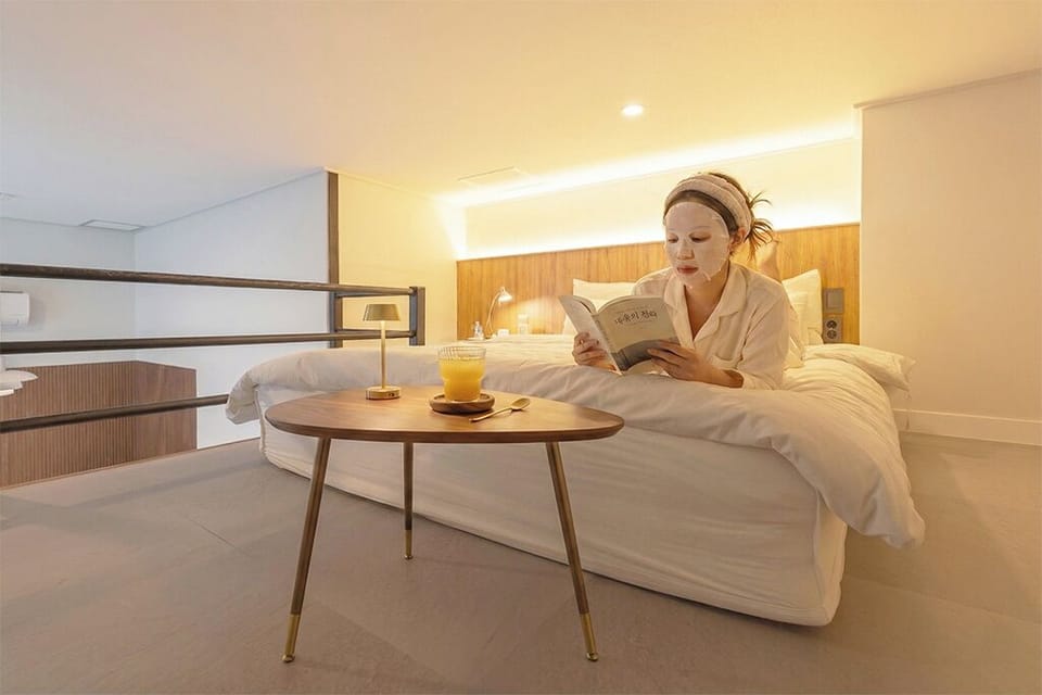 Deluxe Duplex, City View | Hypo-allergenic bedding, down comforters, free minibar