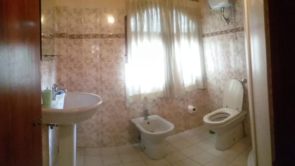 Shower, free toiletries, slippers, towels