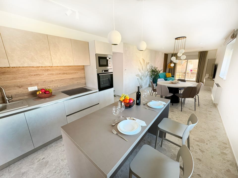 Superior Apartment, 2 Bedrooms, Balcony, Sea View | Private kitchen | Fridge, electric kettle, cleaning supplies