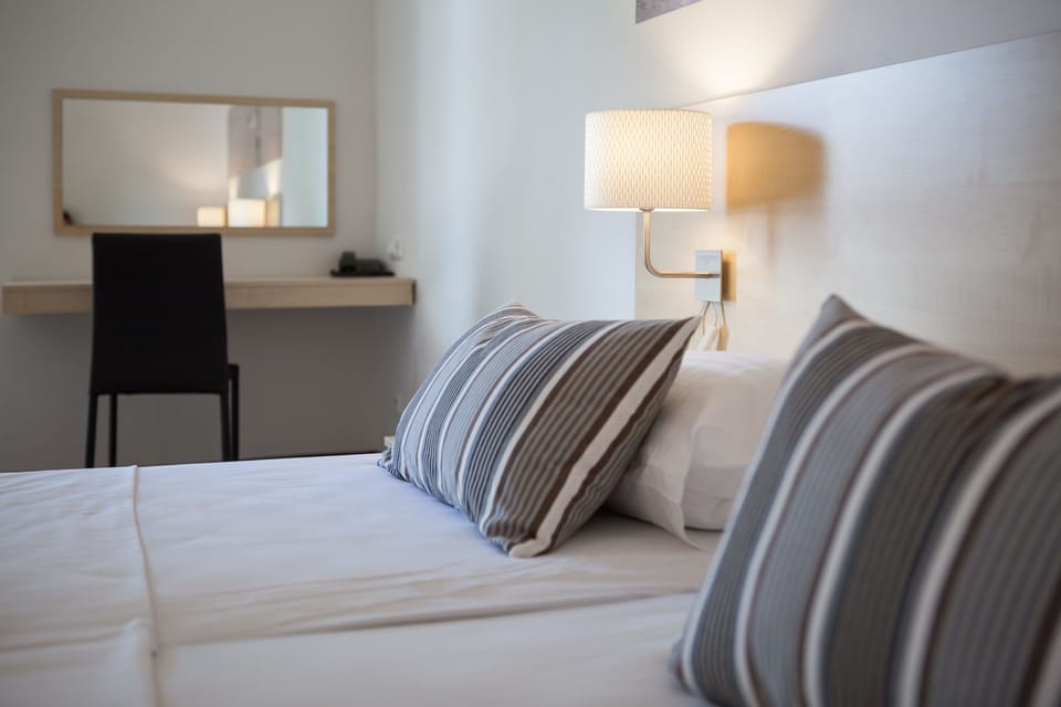 Classic Double Room, Balcony, Sea Side | Minibar, in-room safe, desk, soundproofing