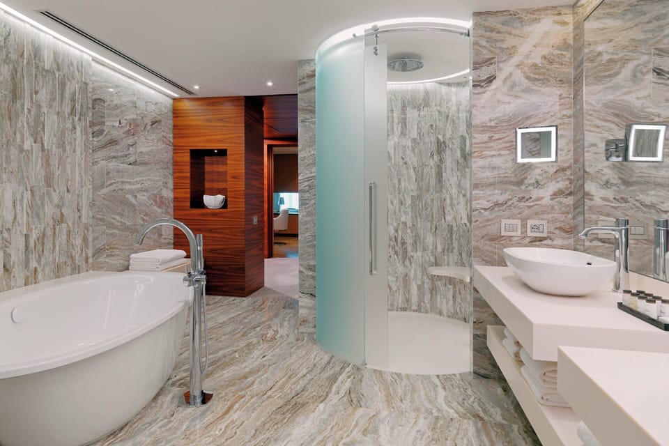 Jetted tub, rainfall showerhead, free toiletries, hair dryer