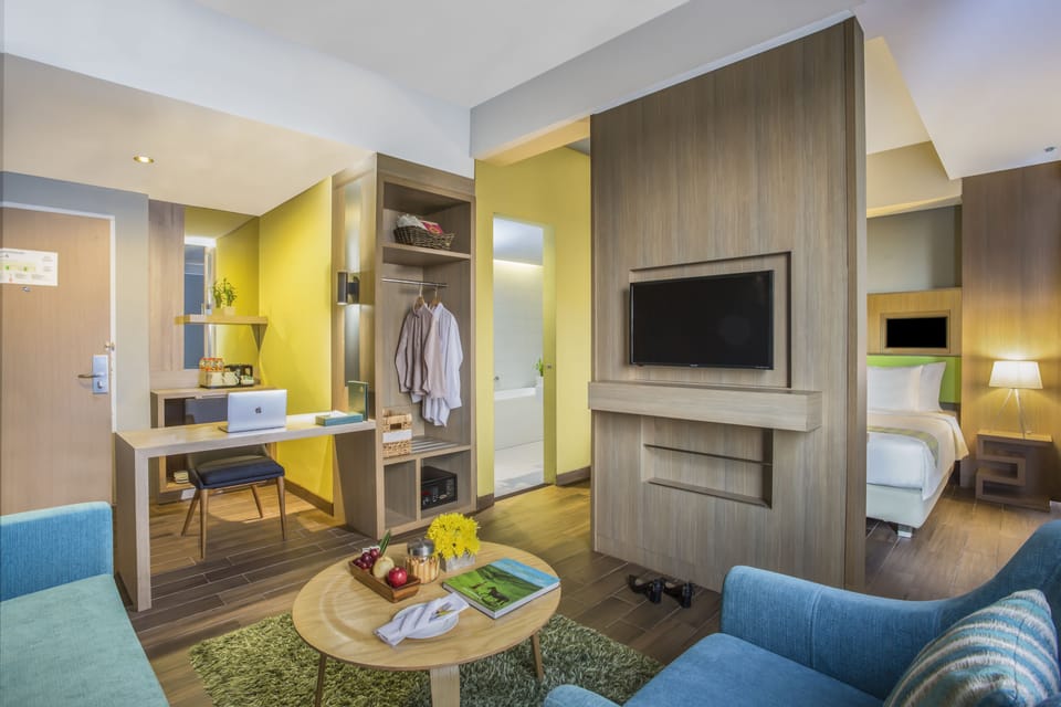 Suite (Breakfast for 2 Pax) | Living room | 32-inch LCD TV with cable channels, TV