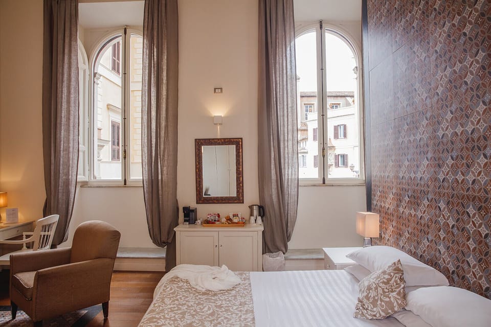Hypo-allergenic bedding, free minibar, in-room safe, desk