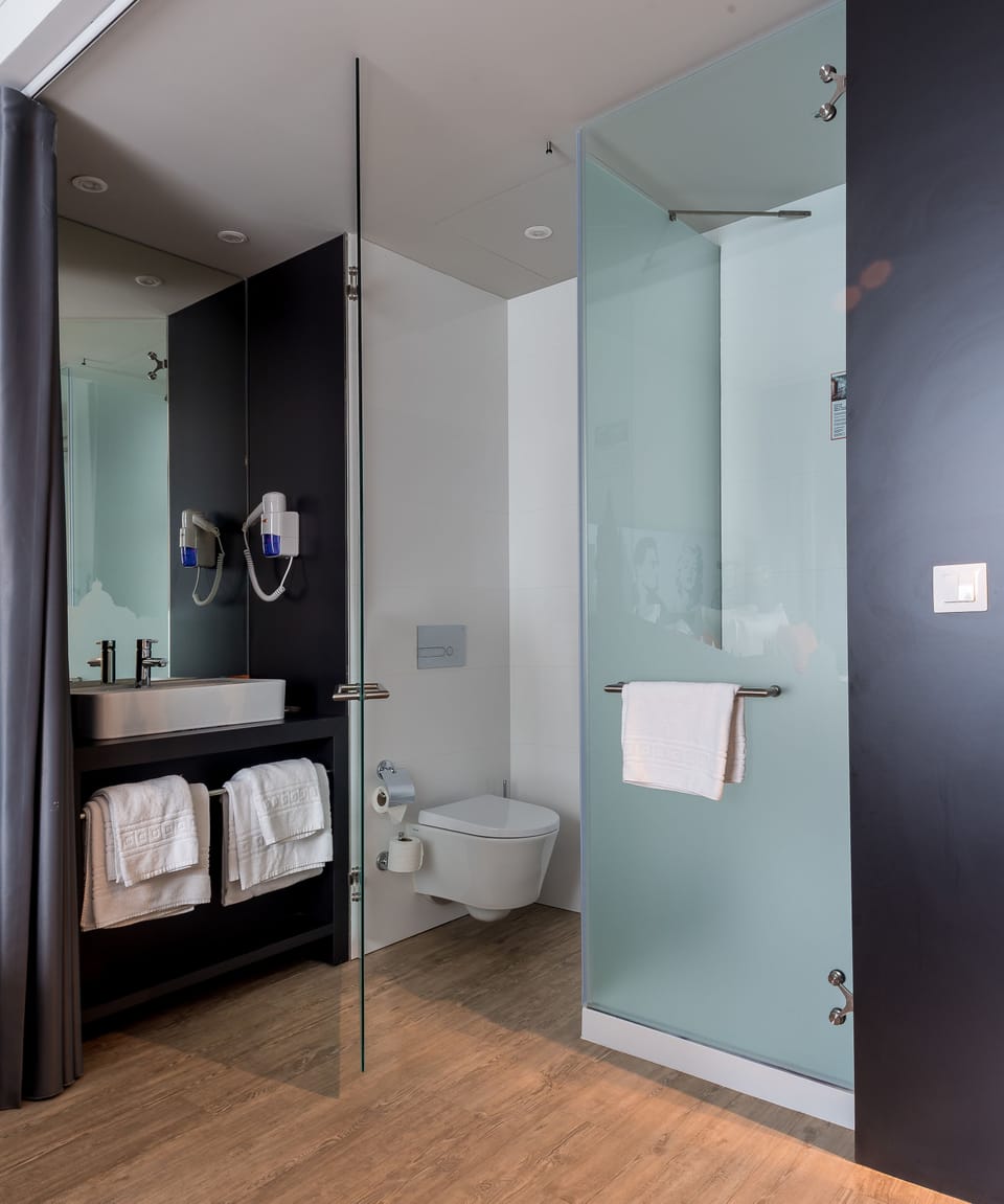 Shower, free toiletries, hair dryer, towels
