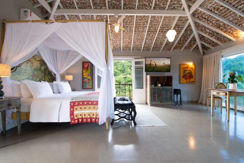 Premier Suite, 1 King Bed, Hot Tub, Partial Ocean View | Premium bedding, minibar, in-room safe, individually decorated