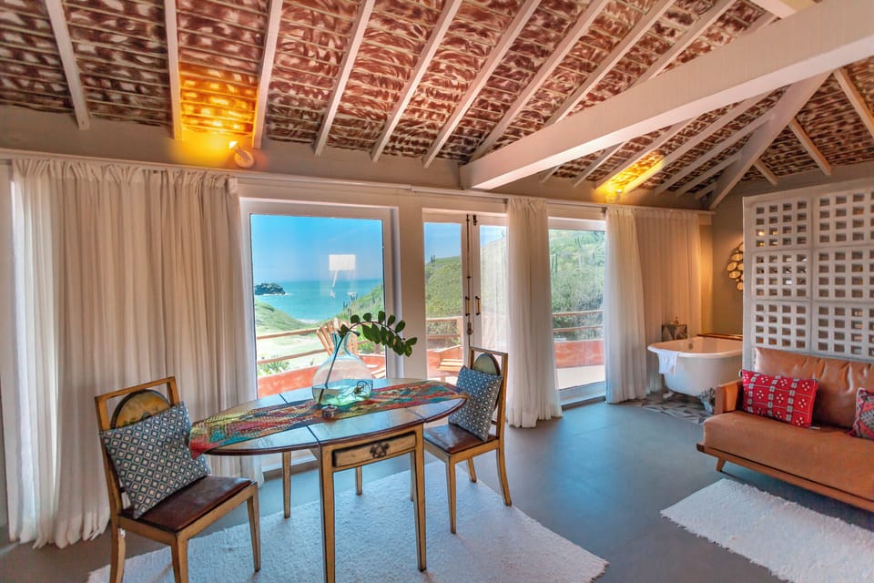 Premier Suite, 1 King Bed, Hot Tub, Partial Ocean View | Premium bedding, minibar, in-room safe, individually decorated
