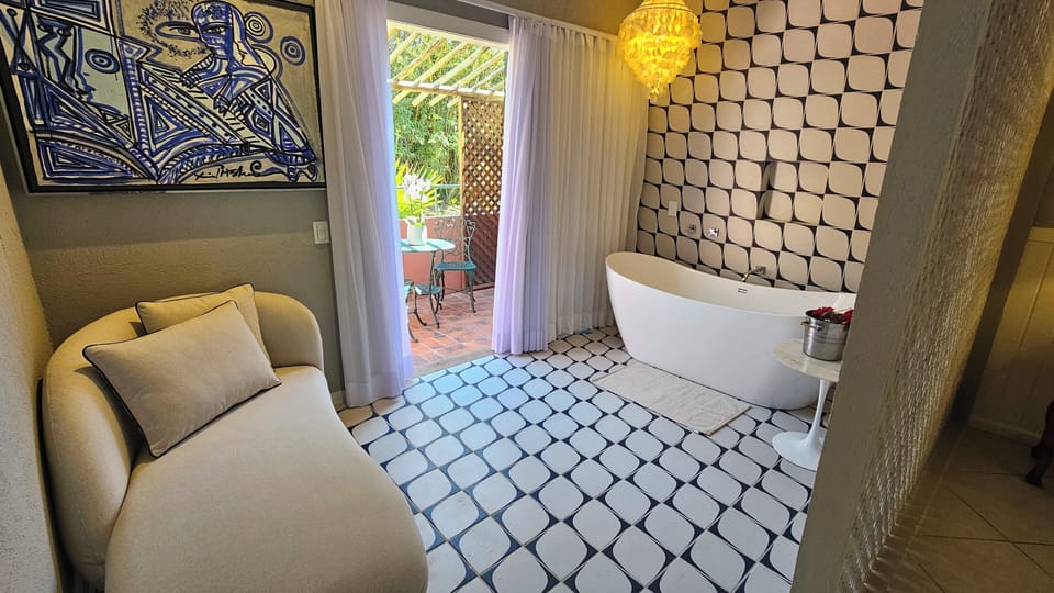 Suite, 1 King Bed, Hot Tub | Premium bedding, minibar, in-room safe, individually decorated