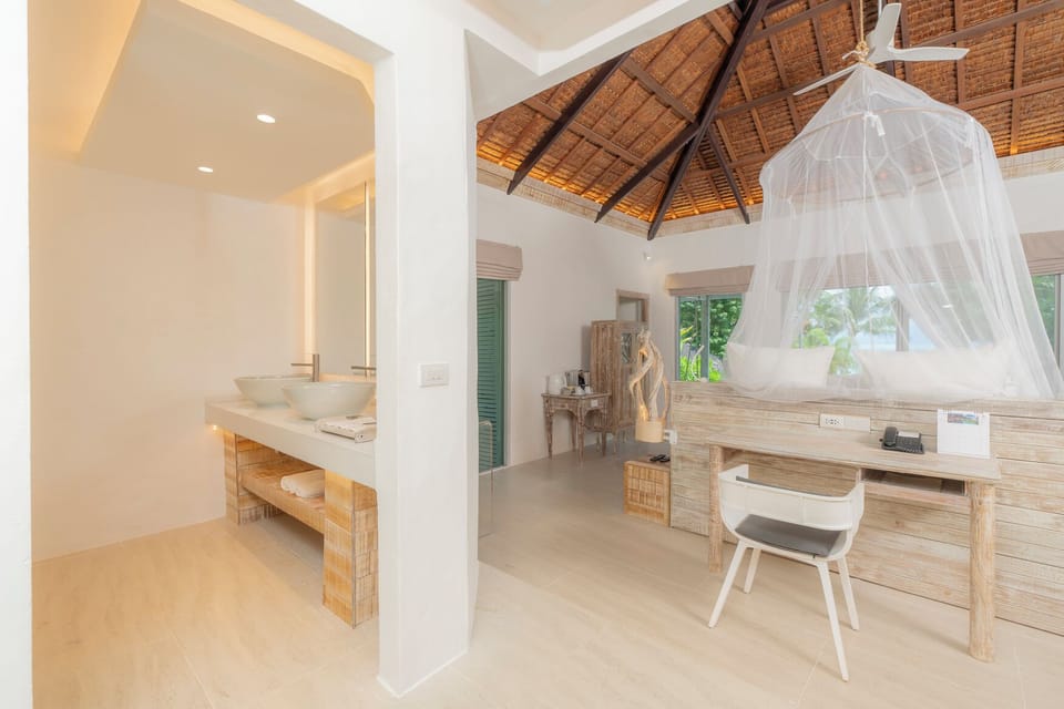 Sea View Pool Villa | Living area | LCD TV, DVD player, table tennis, books