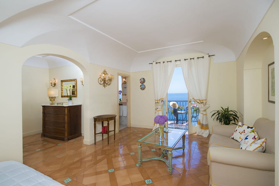 Deluxe Double Room, Balcony, Sea View | Living area | Flat-screen TV