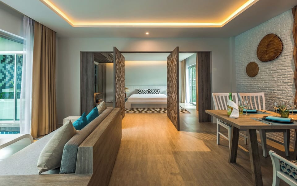 Premium One Bedroom Pool Villa  | Living area | 32-inch LCD TV with cable channels, TV