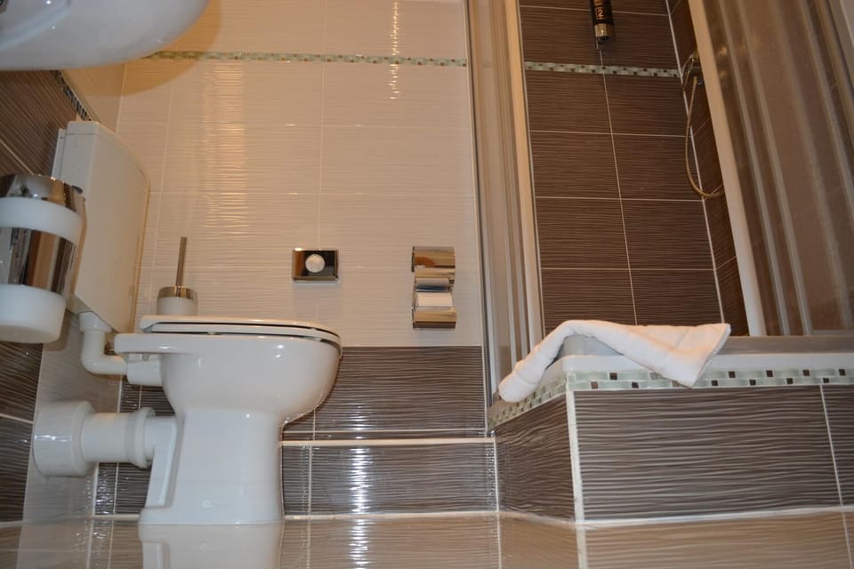 Shower, free toiletries, hair dryer, towels