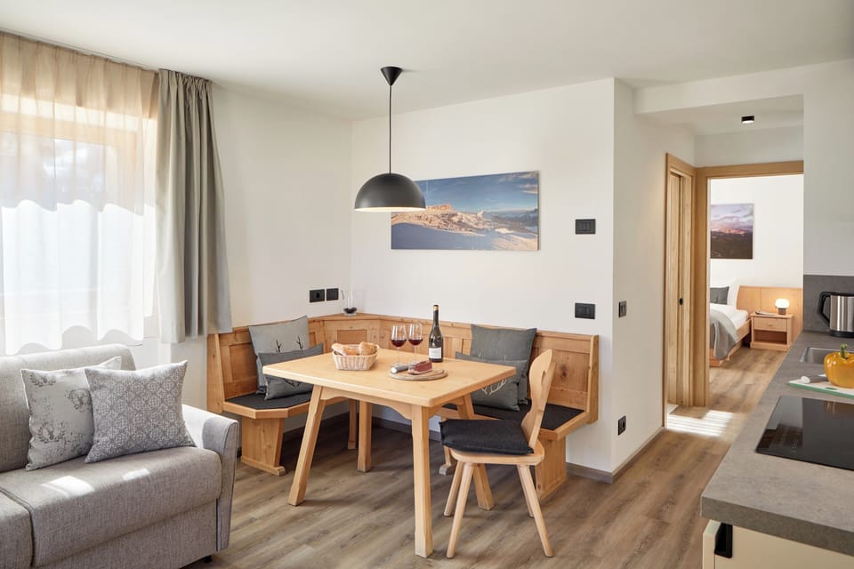 Family Condo (Settsass) | Living area | 20-inch flat-screen TV with satellite channels, TV, heated floors